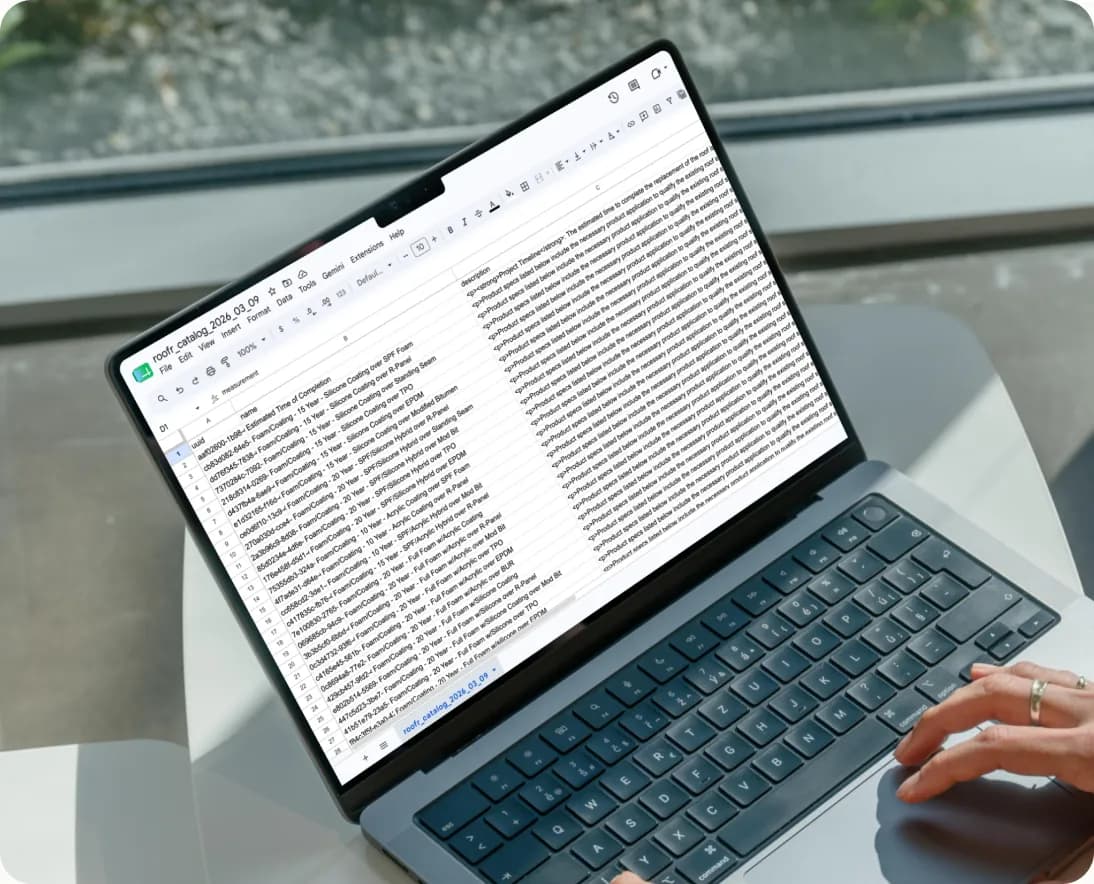 A laptop showing the roofing catalog spreadsheet the team ran jobs from